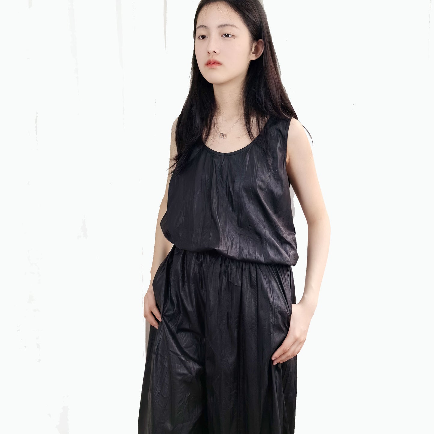 Black crinkle tank top and wide leg pants Light weight man made leather fabric black tank top vegan leather top wide leg trousers