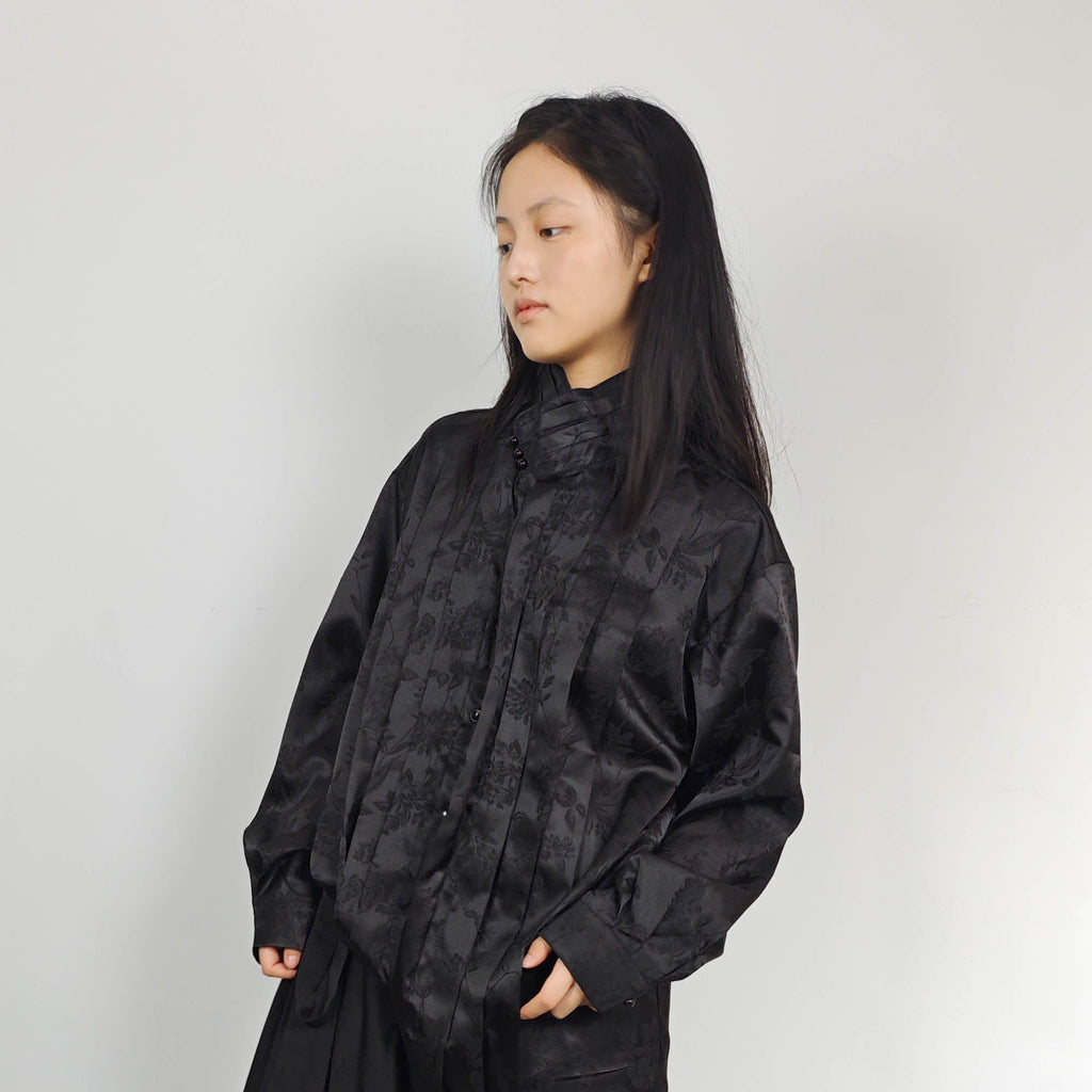 High collar black shirt pleated front details black monochrome jacquard fabric