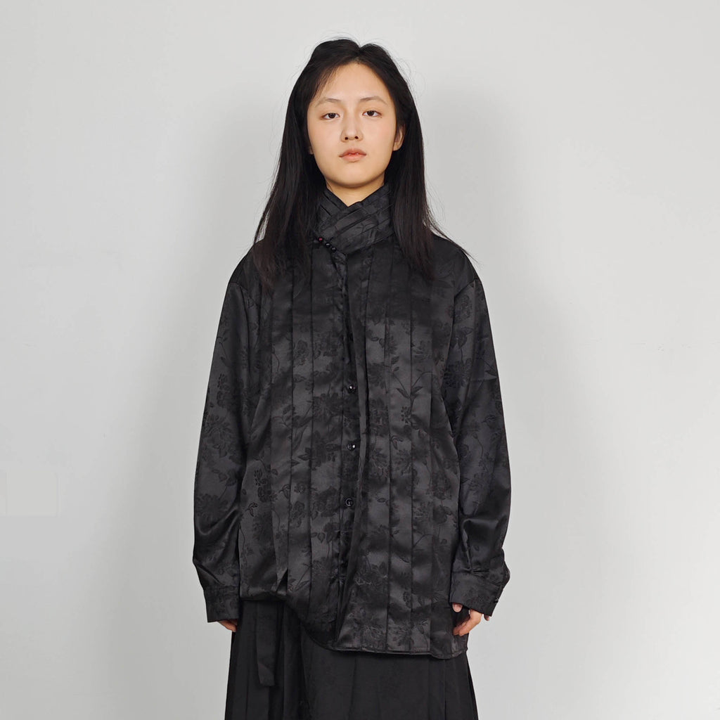 High collar black shirt pleated front details black monochrome jacquard fabric