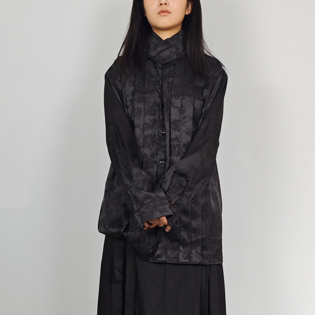 High collar black shirt pleated front details black monochrome jacquard fabric