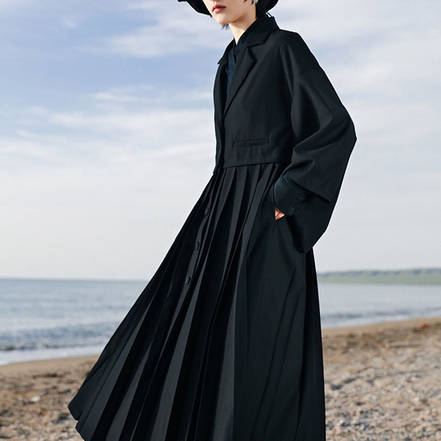 Suit dress with squared sleeves and pleated skirt Black suiting fabric dress