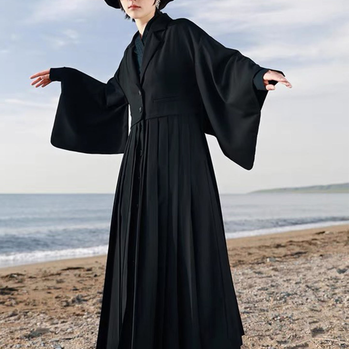 Suit dress with squared sleeves and pleated skirt Black suiting fabric dress